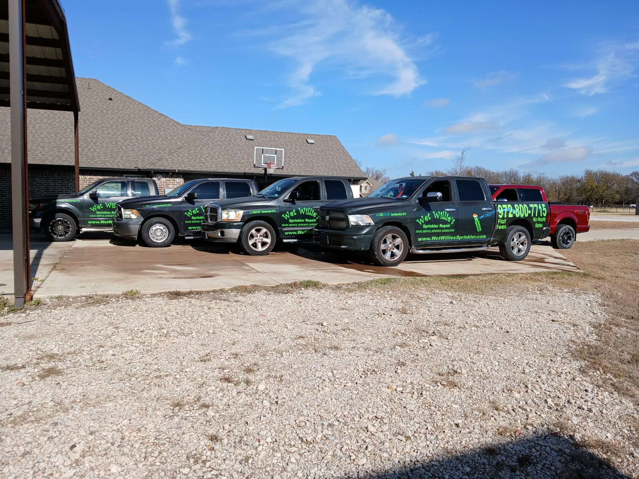 Wet Willie's Sprinkler Repair branded service truck fleet